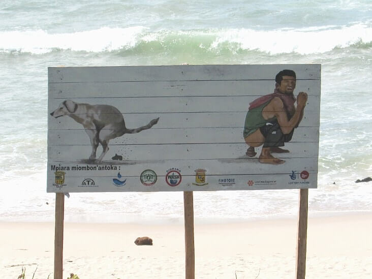 The controversial signboard used to encourage people to stop openly defecating.-min.jpg
