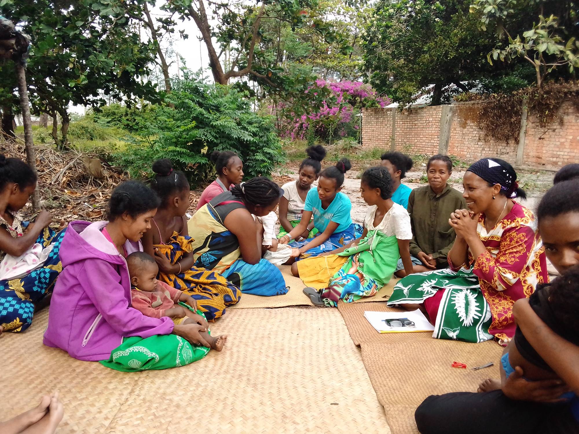 A group of mothers and caregivers take part in a Project Votsira education session