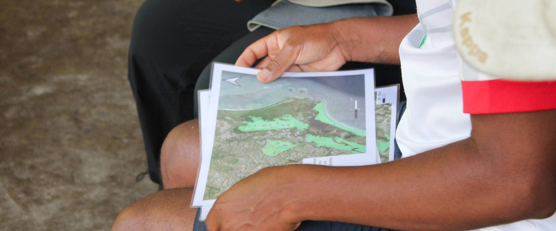 Person holding a map