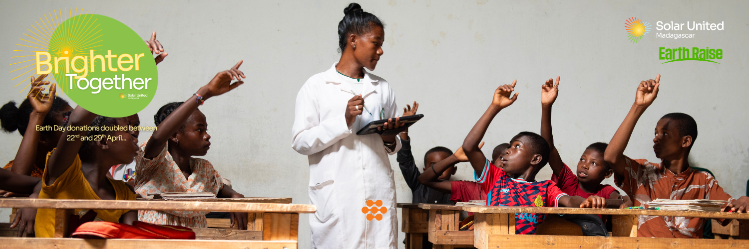 A teacher using a tablet to deliver a lesson in Primary School