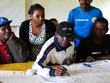 Participants working on the community mapping together.jpeg