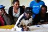 Participants working on the community mapping together.jpeg